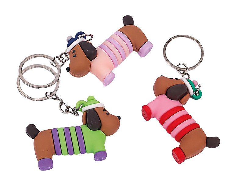 Schlüsselanhänger aus Kunststoff mit Dackel 5,5x1x4cm