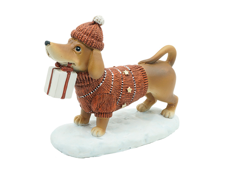 Dackel mit Geschenk aus Poly 12x5x9cm    Dackel mit Geschenk aus Poly 12x5x9cm