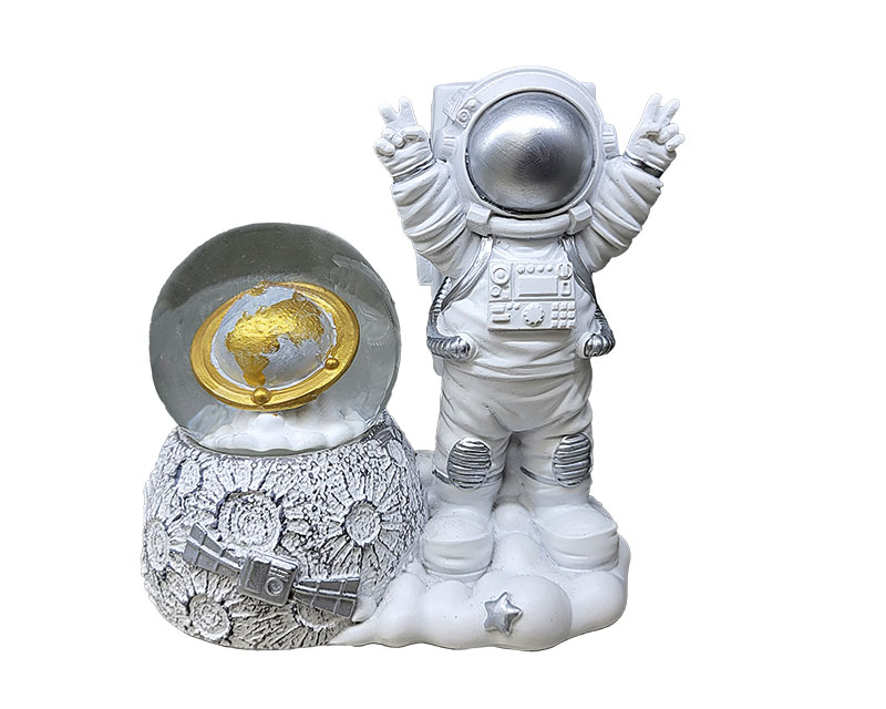 Poly snow globe astronaut 9x5x9cm