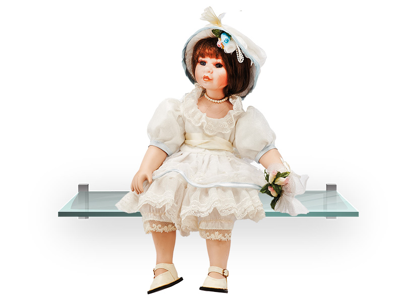 25010 Porz. Puppe sitzend