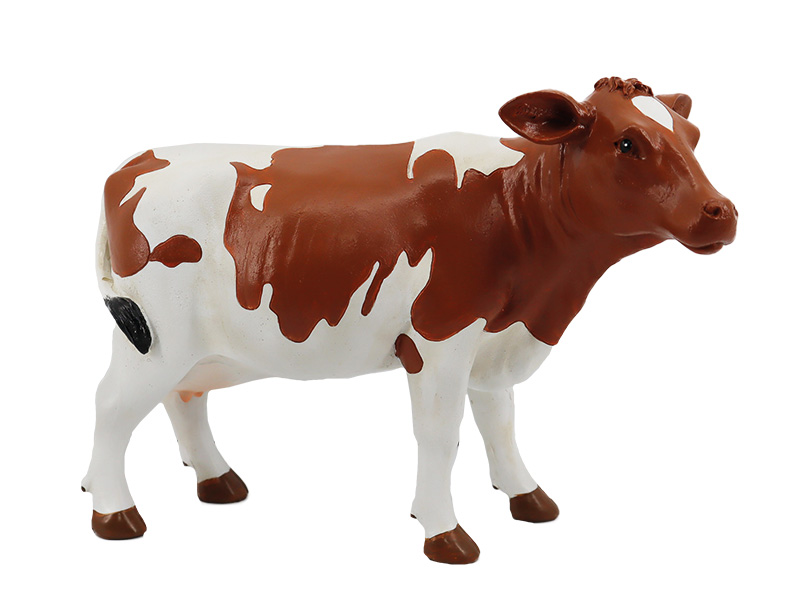 Kuh aus Poly, braun/weiß, 24x10x18cm   